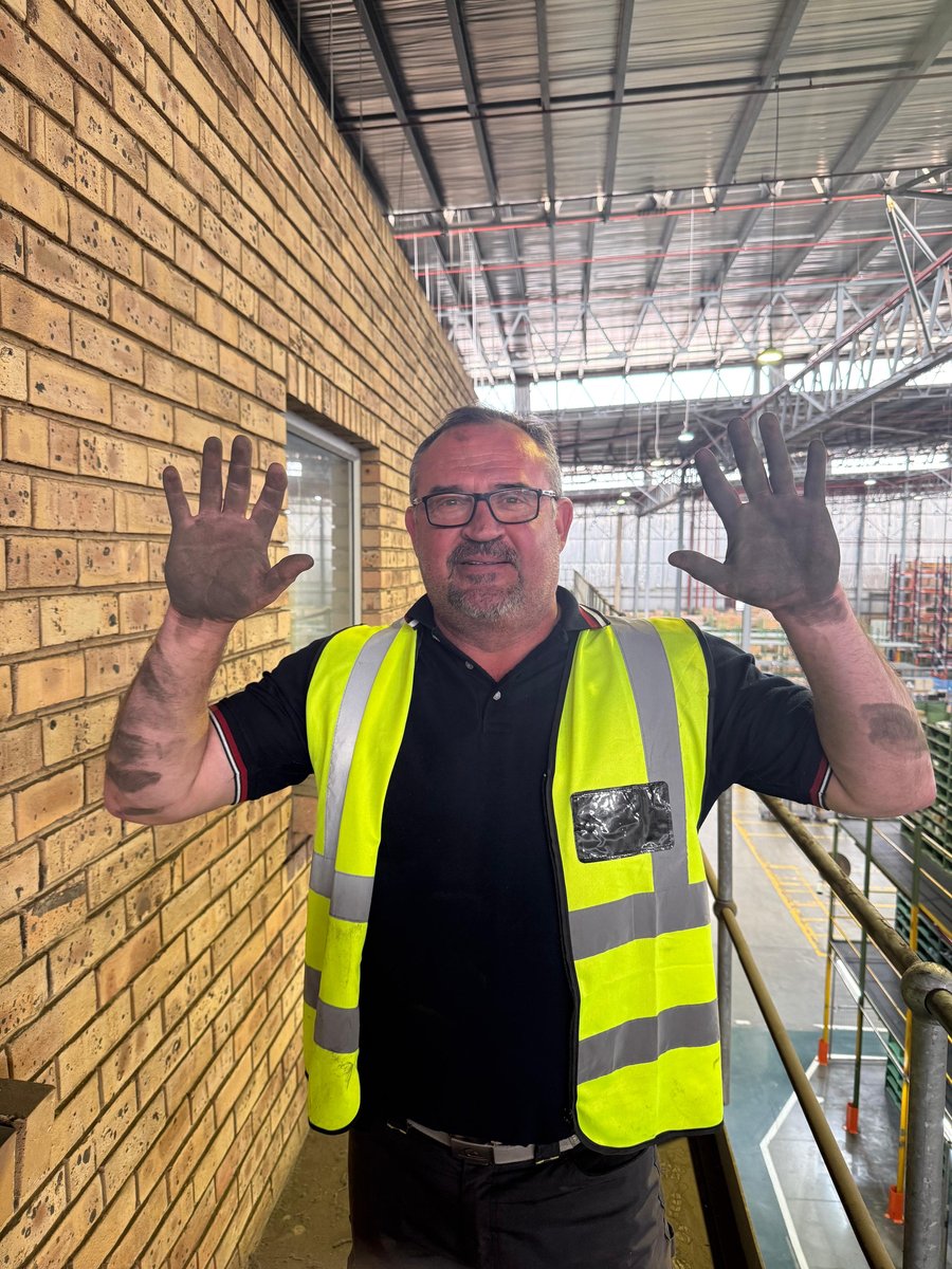 NV Power and Construction's CEO showing his hands, dirty from working on site