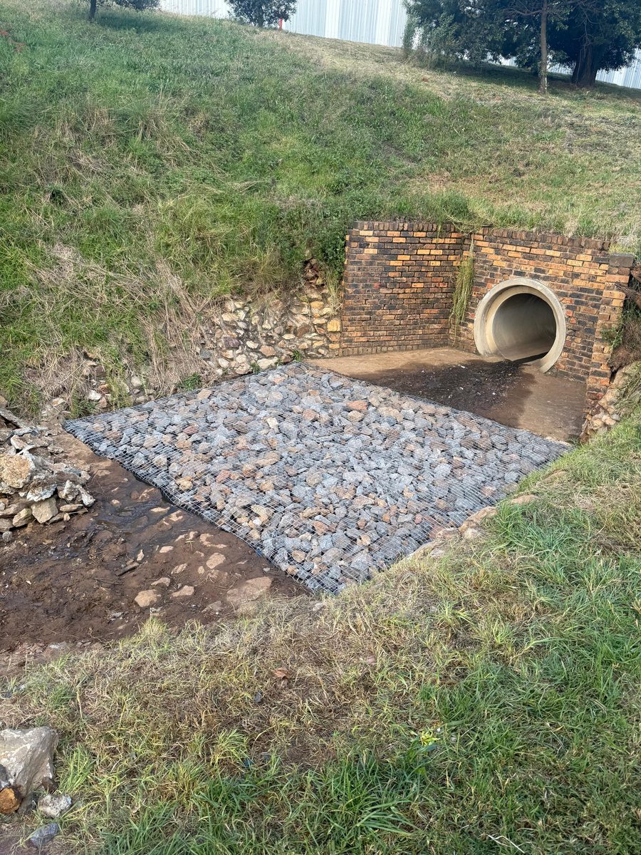 Gabion reno mattress erosion control installed at a stormwater culvert outlet